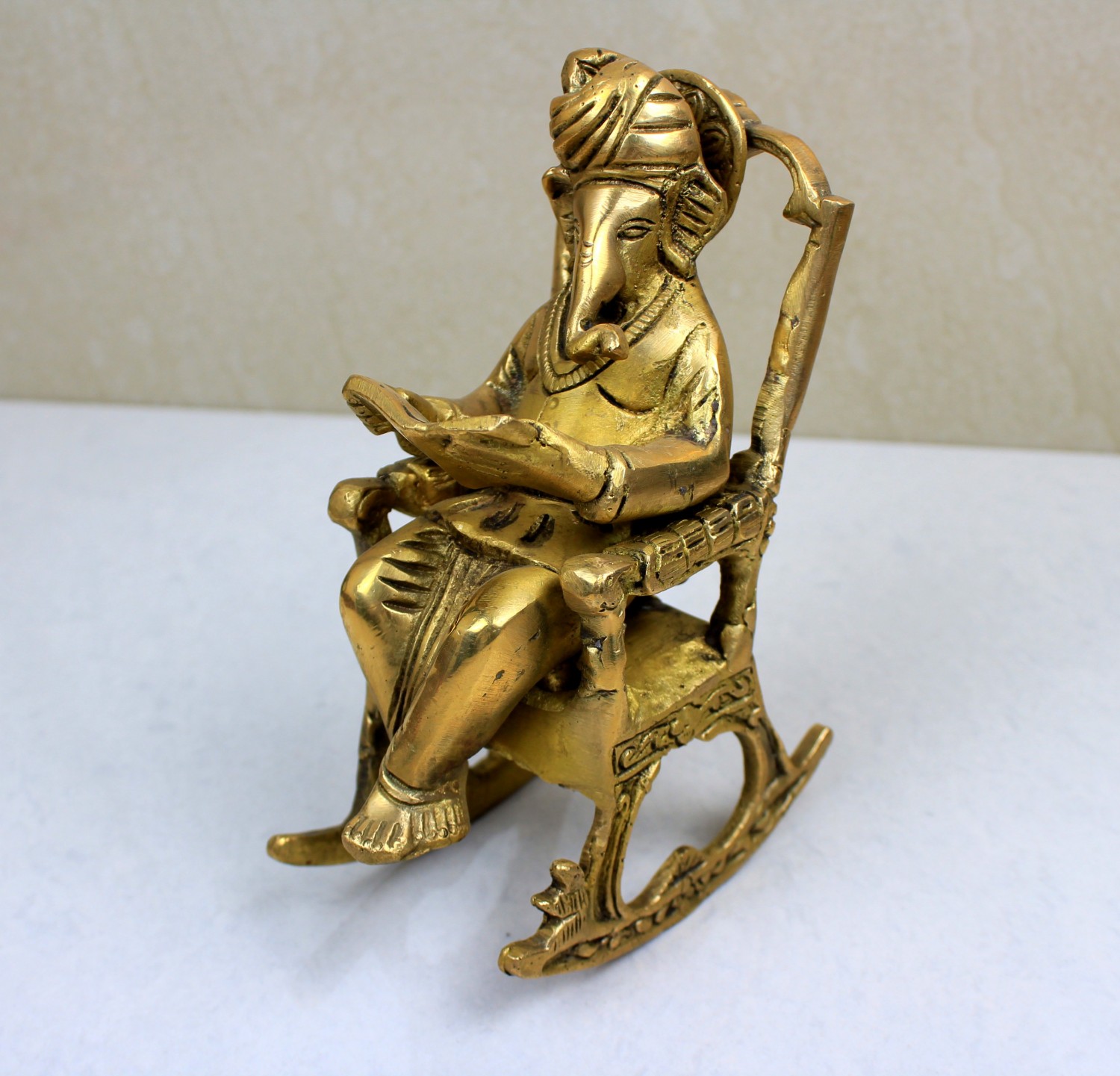 BRASS FINISH ROCKING CHAIR GANESH